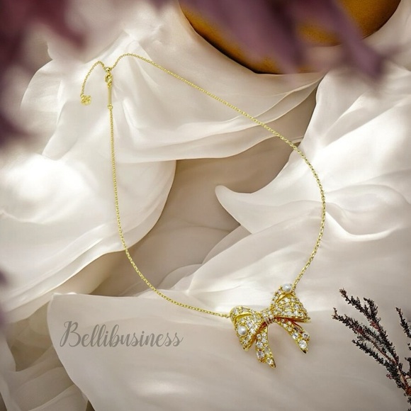 Kendra Scott Krista Gold Bow Short Pendant Necklace in White Mix - Picture 5 of 7